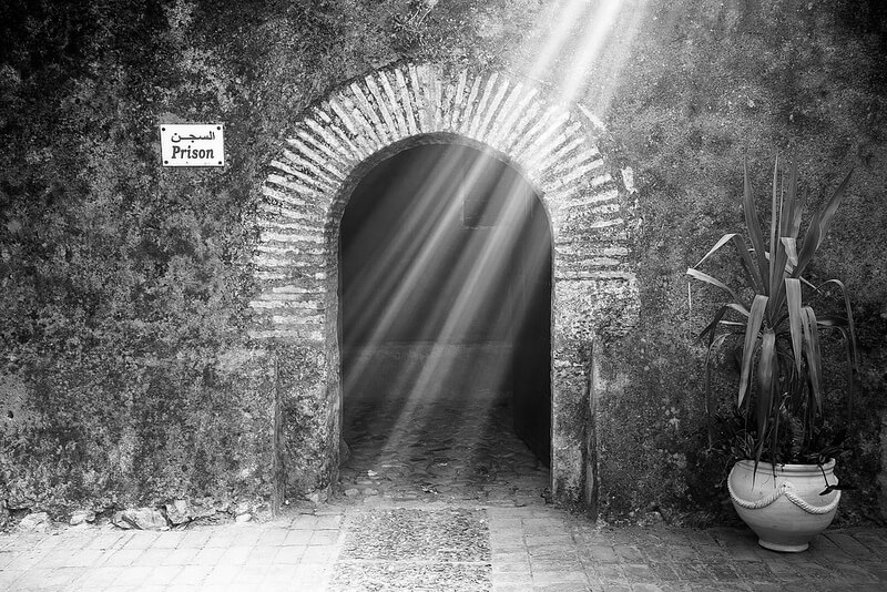 black and white entrance to prison