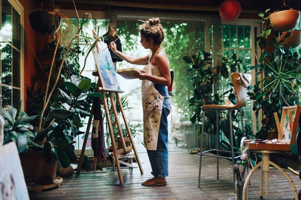 Woman painter in her painting studio.