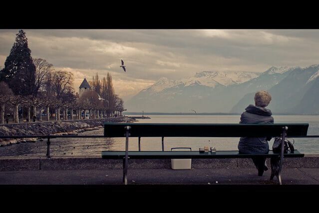 woman sitting on bench